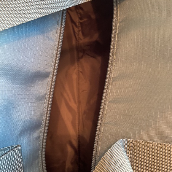 New roomy green sage colored duffle bag, outside pocket, full zipper closure. - Picture 6 of 7